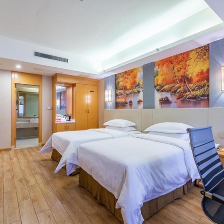 Imagen de la habitación del Hotel Vienna International Hotel Wuyi Square. Foto 18