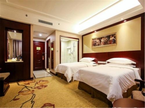 Imagen general del Hotel Vienna International Hotel(National Exhibition and Convention Center & West Tianshan Road). Foto 1