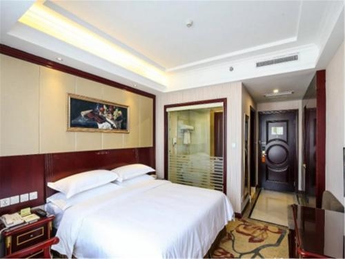 Imagen de la habitación del Hotel Vienna International Hotel(National Exhibition and Convention Center & West Tianshan Road). Foto 7