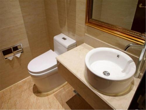 Imagen de la habitación del Hotel Vienna International Hotel(National Exhibition and Convention Center & West Tianshan Road). Foto 10