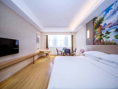 Imagen de la habitación del Hotel Vienna International Hubei Zhongxiang Zhongbai Square. Foto 11