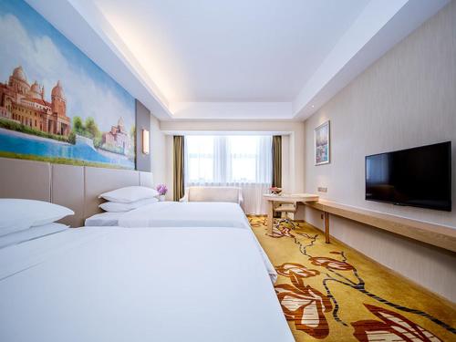 Imagen de la habitación del Hotel Vienna International Hubei Zhongxiang Zhongbai Square. Foto 12