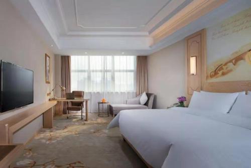 Imagen de la habitación del Hotel Vienna International Jiangsu Wuxi Taihu Expo Center. Foto 14