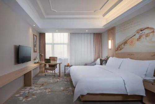 Imagen de la habitación del Hotel Vienna International Jiangsu Wuxi Taihu Expo Center. Foto 15