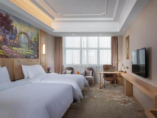 Imagen de la habitación del Hotel Vienna International Jiangsu Wuxi Taihu Expo Center. Foto 16