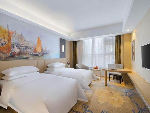 Imagen de la habitación del Hotel Vienna International Jurong Huayang. Foto 14