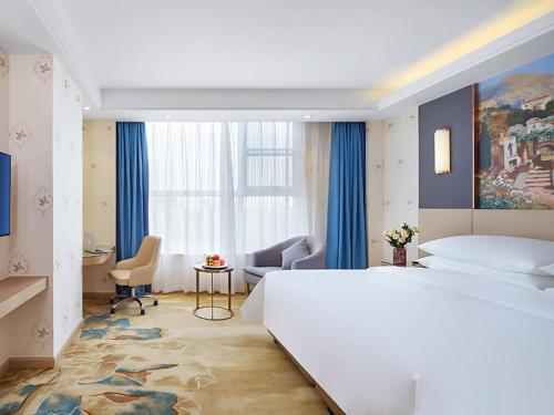 Imagen de la habitación del Hotel Vienna International Jurong Huayang. Foto 19