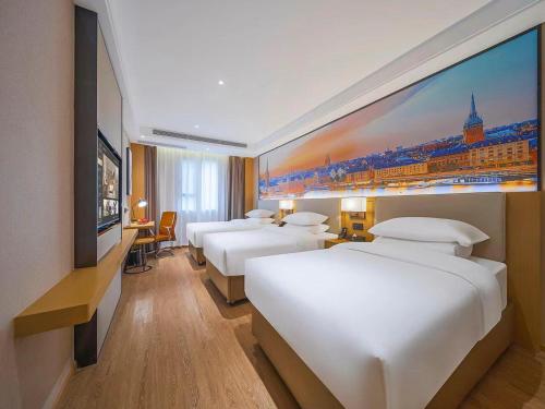 Imagen de la habitación del Hotel Vienna International Kunming longquan road Finance University. Foto 11
