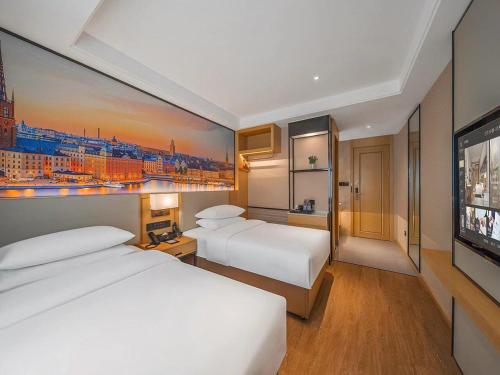 Imagen general del Hotel Vienna International Kunming longquan road Finance University. Foto 6