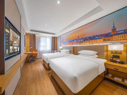 Imagen de la habitación del Hotel Vienna International Kunming longquan road Finance University. Foto 13