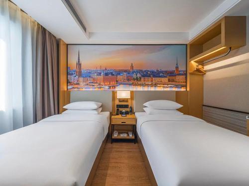 Imagen de la habitación del Hotel Vienna International Kunming longquan road Finance University. Foto 15