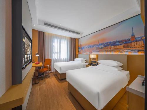 Imagen de la habitación del Hotel Vienna International Kunming longquan road Finance University. Foto 17