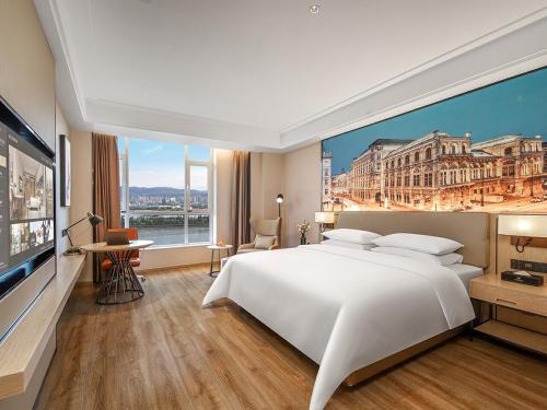 Imagen de la habitación del Hotel Vienna International Lanzhou SASSEUR Outlets & Yellow Riverside. Foto 11