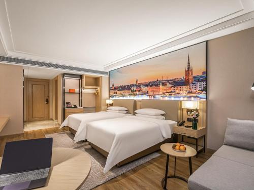 Imagen de la habitación del Hotel Vienna International Lanzhou SASSEUR Outlets & Yellow Riverside. Foto 13