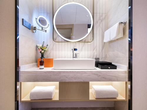Imagen de la habitación del Hotel Vienna International Lanzhou SASSEUR Outlets & Yellow Riverside. Foto 16