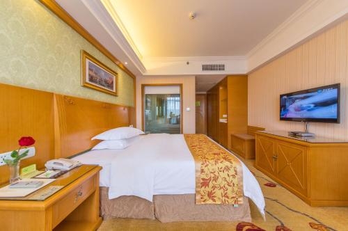 Imagen de la habitación del Hotel Vienna International Lijiang Yuxue Avenue. Foto 7
