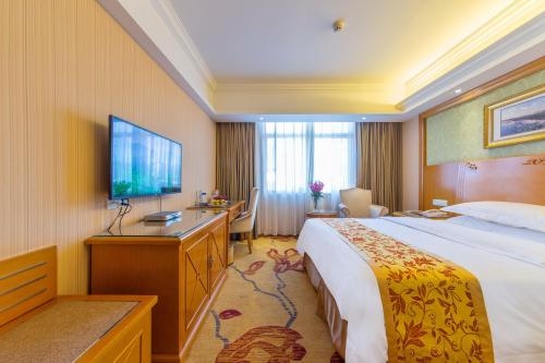 Imagen de la habitación del Hotel Vienna International Lijiang Yuxue Avenue. Foto 8