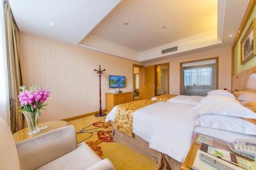 Imagen general del Hotel Vienna International Lijiang Yuxue Avenue. Foto 1