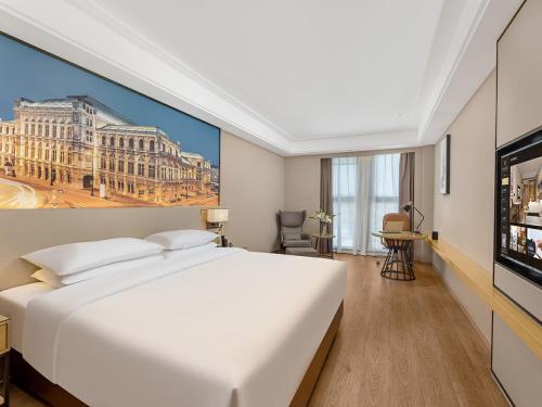 Imagen de la habitación del Hotel Vienna International Linqu Wanda Plaza. Foto 14
