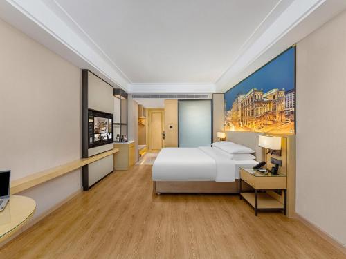 Imagen de la habitación del Hotel Vienna International Linqu Wanda Plaza. Foto 19