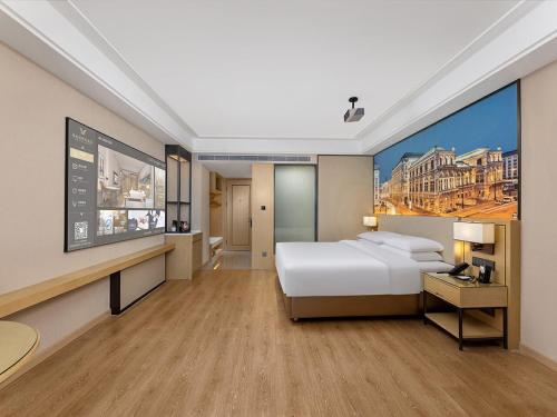 Imagen de la habitación del Hotel Vienna International Linqu Wanda Plaza. Foto 20