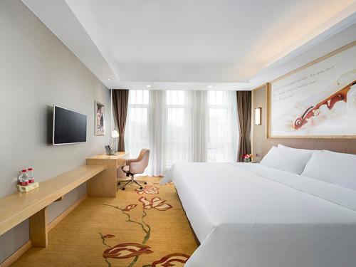 Imagen de la habitación del Hotel Vienna International Mongolia Chifeng High-Speed Railway Station. Foto 8