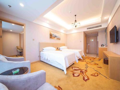 Imagen de la habitación del Hotel Vienna International Nanjing Dongshan Headquarters. Foto 9