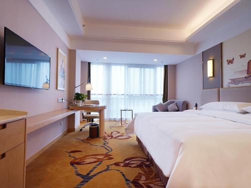 Imagen de la habitación del Hotel Vienna International Nanjing Dongshan Headquarters. Foto 11