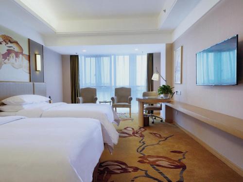 Imagen de la habitación del Hotel Vienna International Nanjing Dongshan Headquarters. Foto 12