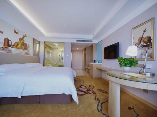 Imagen de la habitación del Hotel Vienna International Nanjing Dongshan Headquarters. Foto 13