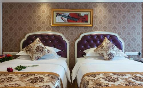 Imagen de la habitación del Hotel Vienna International Nanning Zoo. Foto 6