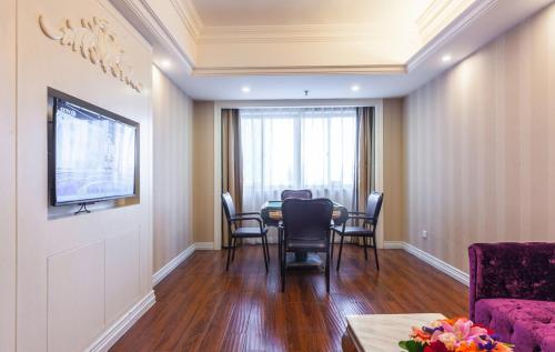 Imagen de la habitación del Hotel Vienna International Nanning Zoo. Foto 9