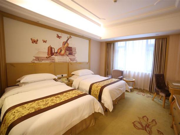 Imagen de la habitación del Hotel Vienna International Shanghai Pujiang Town. Foto 4