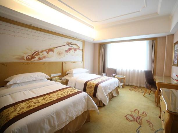 Imagen de la habitación del Hotel Vienna International Shanghai Pujiang Town. Foto 6