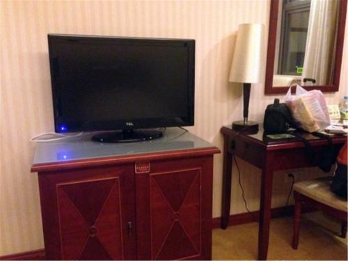 Imagen de la habitación del Hotel Vienna International Shanghai Songjiang. Foto 7