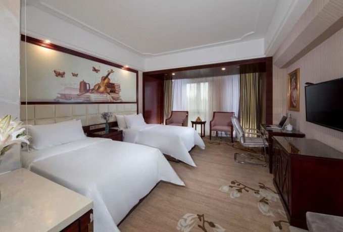 Imagen de la habitación del Hotel Vienna International - Shantou Simapu. Foto 5