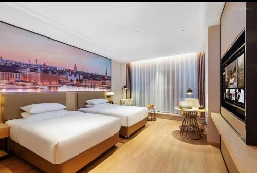 Imagen de la habitación del Hotel Vienna International - Shenzhen Baolong Metro Station. Foto 18