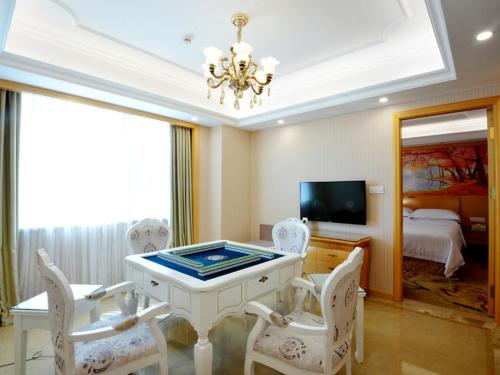 Imagen de la habitación del Hotel Vienna International Shenzhen Guangming Aven. Foto 5