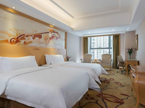 Imagen de la habitación del Hotel Vienna International Shenzhen Qianhai. Foto 7