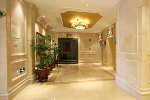 Imagen de la habitación del Hotel Vienna International Shenzhen Qianhai. Foto 8