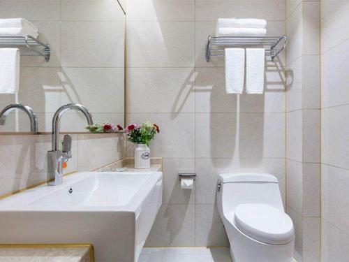 Imagen de la habitación del Hotel Vienna International Taizhou Wenling Branch. Foto 14