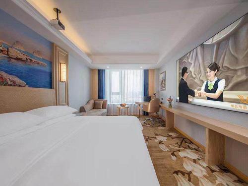 Imagen de la habitación del Hotel Vienna International Taizhou Wenling Branch. Foto 15