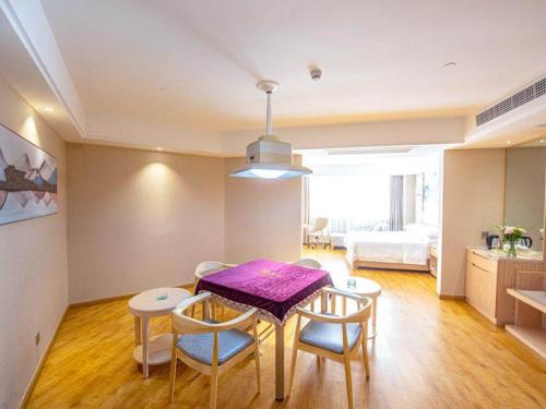 Imagen de la habitación del Hotel Vienna International Taizhou Wenling Branch. Foto 19