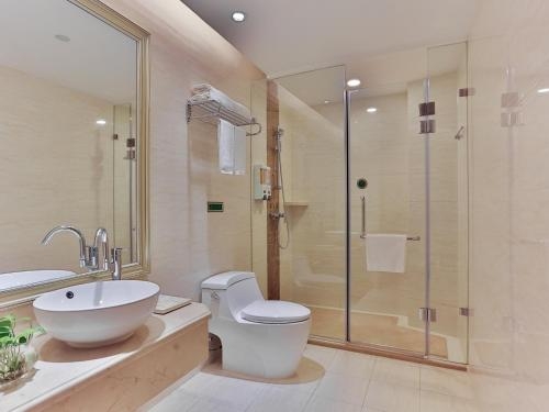 Imagen de la habitación del Hotel Vienna International Tianjin Guizhou Road. Foto 6