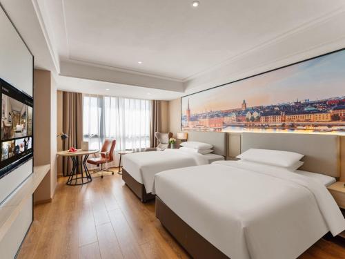 Imagen de la habitación del Hotel Vienna International Xiamen Tong\'an Industrial Concentration Area. Foto 19