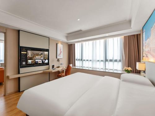 Imagen de la habitación del Hotel Vienna International Xiamen Tong\'an Industrial Concentration Area. Foto 20