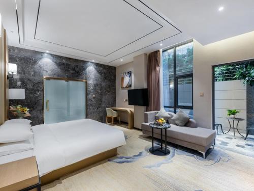 Imagen de la habitación del Hotel Vienna International Xiamen University. Foto 10