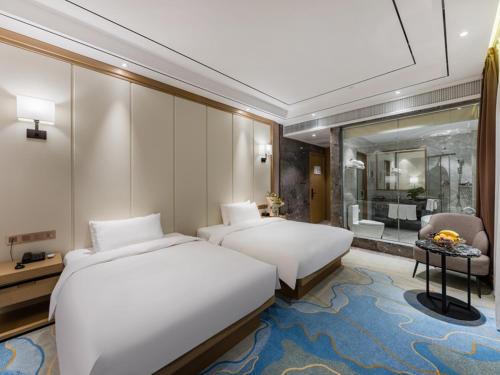 Imagen de la habitación del Hotel Vienna International Xiamen University. Foto 11