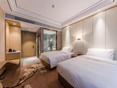 Imagen de la habitación del Hotel Vienna International Xiamen University. Foto 13