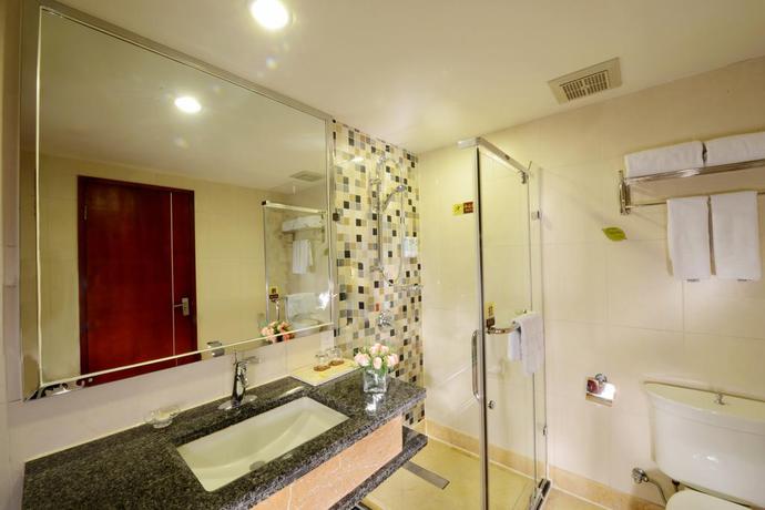 Imagen de la habitación del Hotel Vienna International- Xiangyang Railway Station. Foto 12